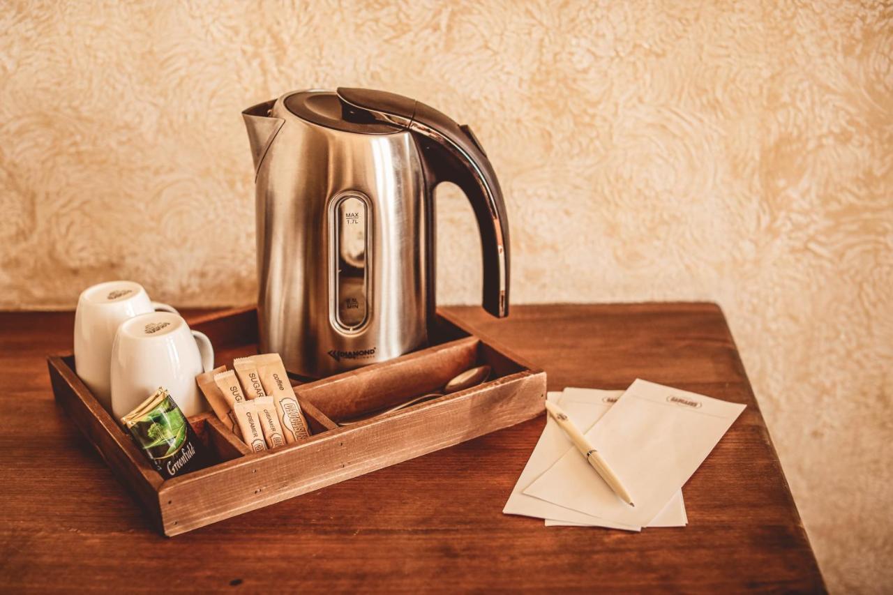Caucasus Hotel Kasagh Exterior photo A kettle in a hotel room